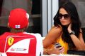 Ferrari-Pilot Kimi Räikkönen mit Freundin Minttu Virtanen im Fahrerlager der Formel 1