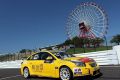 Kin Veng Ng und sein Chevrolet vor dem bekannten Riesenrad am Suzuka Circuit