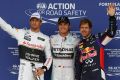 Polesetter Nico Rosberg jubelt mit Jenson Button und Landsmann Sebastian Vettel