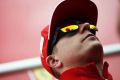 Rot statt Blau oder Schwarz: Kimi Räikkönen passt die neue alte Klamotte