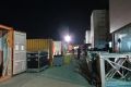 Sonntagabend in Peking: Das Beladen der Container zum Transport nach Schanghai